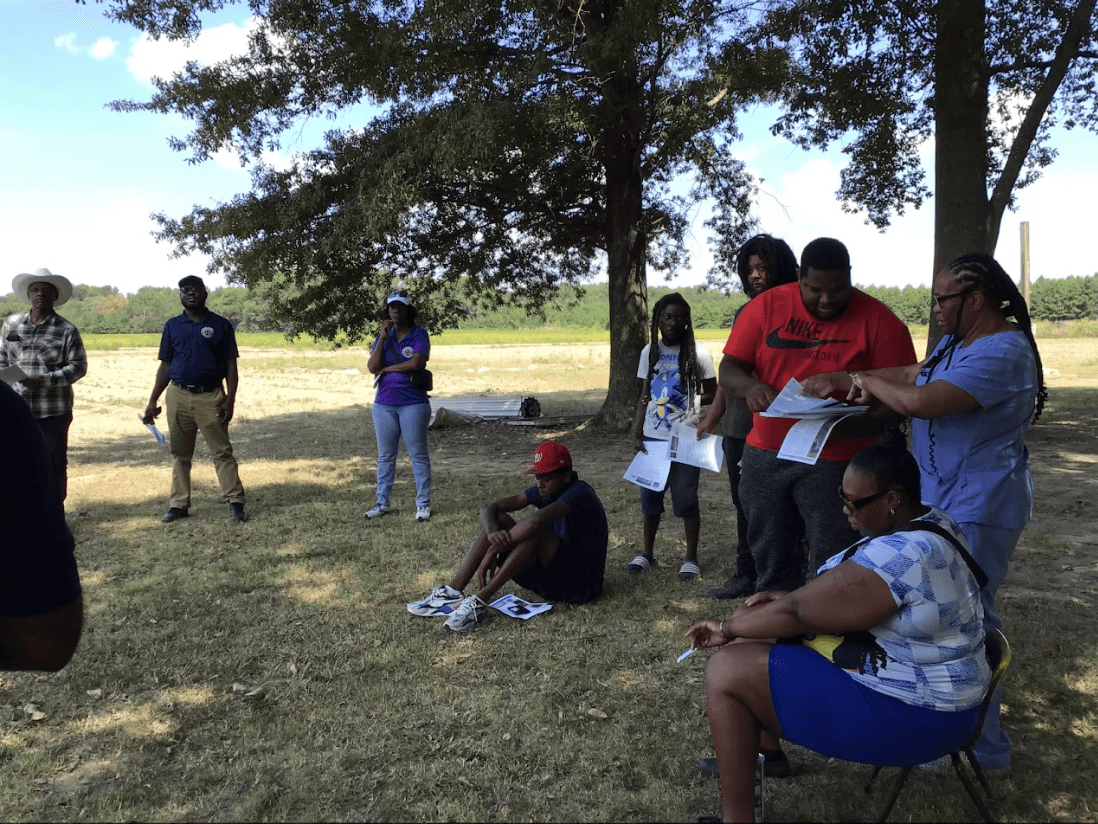 Farmers learning cover cropping techniques